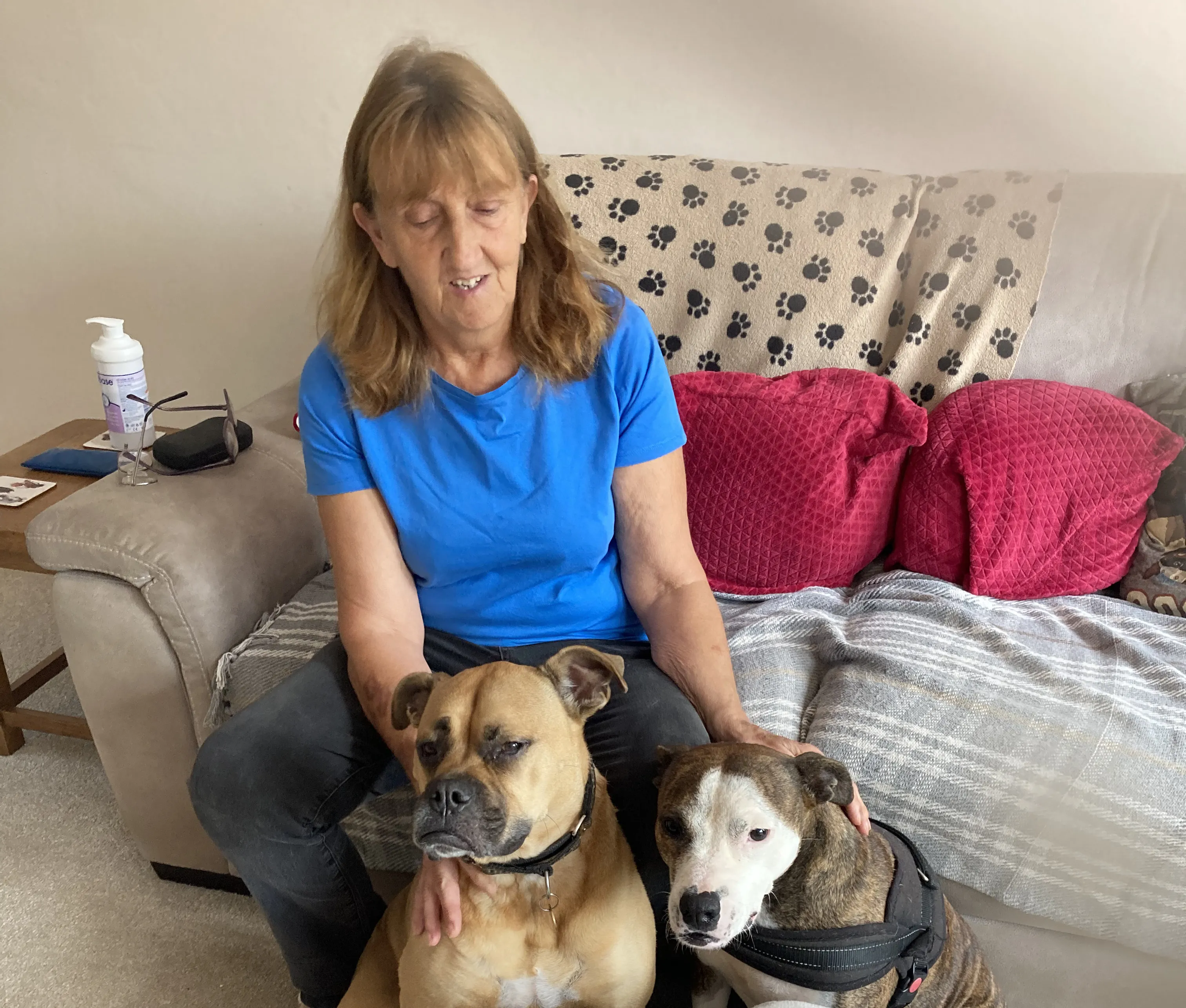 Theresa with dogs in countryside